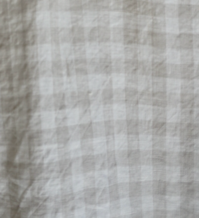 A close up product image of Simple Linen Co's Dove Grey Gingham 100% French flax linen material.