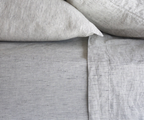 Simple Linen Co. 100% French flax linen sheet set in Pinstripe, stonewashed for added softness and durability, sheet set includes pillowcases, flat sheet and fitted sheet, sustainably packaged in reusable linen drawstring bag.